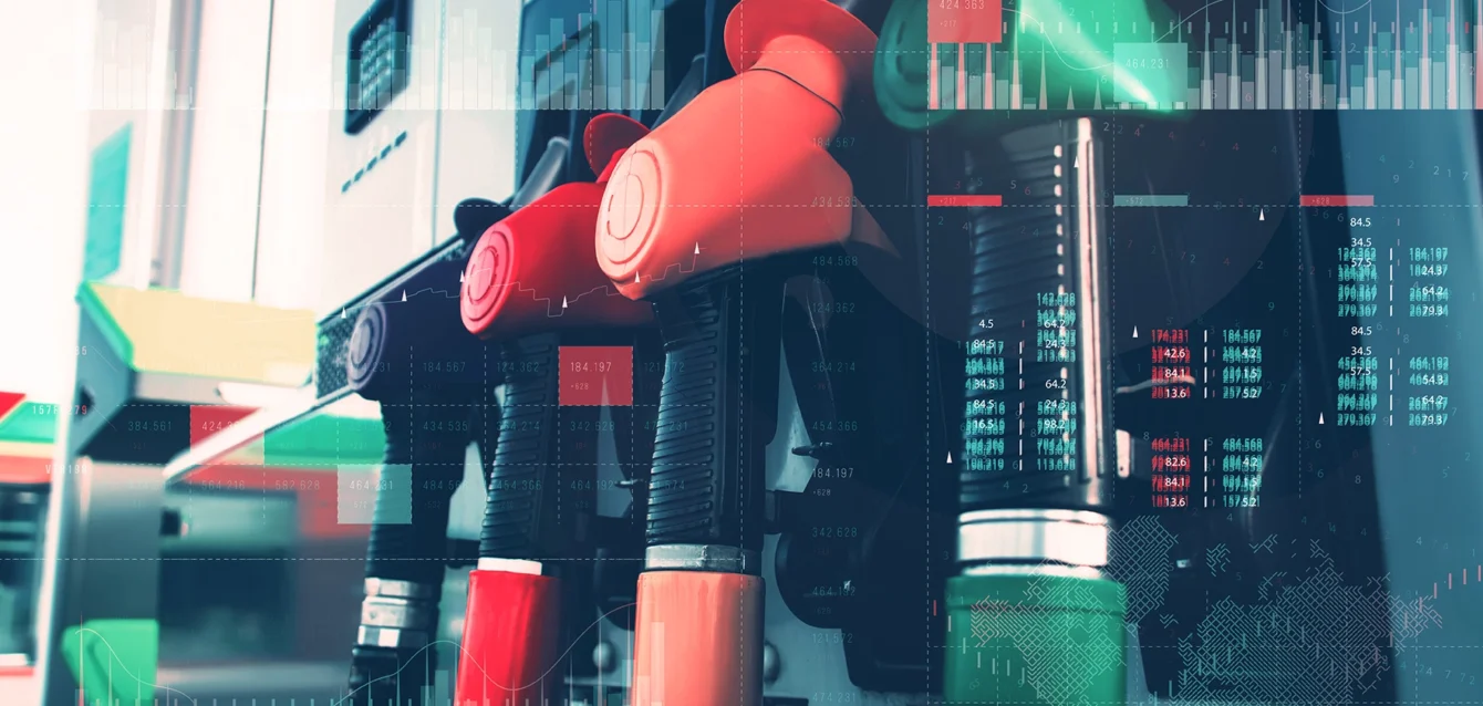 gas-station-with-fuel-dispensers-technological-background-graph-rising-prices-gasoline-fuel (1)